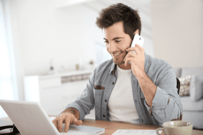 Can I Start My Own Business As An IC, Man Talking on Phone at Computer