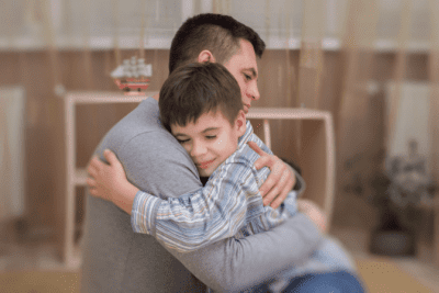 Employee Insubordination, Man Hugging Child