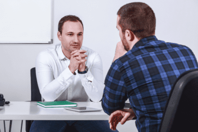 Employee Insubordination, Men Conversing at Work