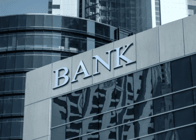 Business Bank Account Building With Bank Sign