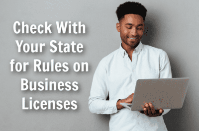 Business Bank Account, Man Holding Computer, Check With Your State for Rules on Business Licenses