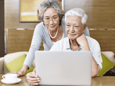 How to Choose a Company Name, Couple Looking at Computer