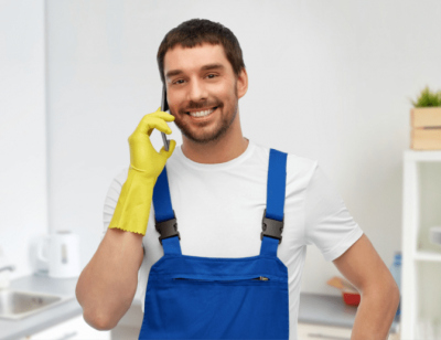 Cleaning Time Management Male Cleaner on Phone