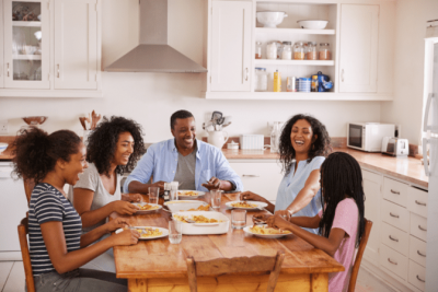 Living a Life of Wealth, Happy Family Having Meal