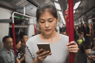 Smartphone Ready, Woman Looks at Phone